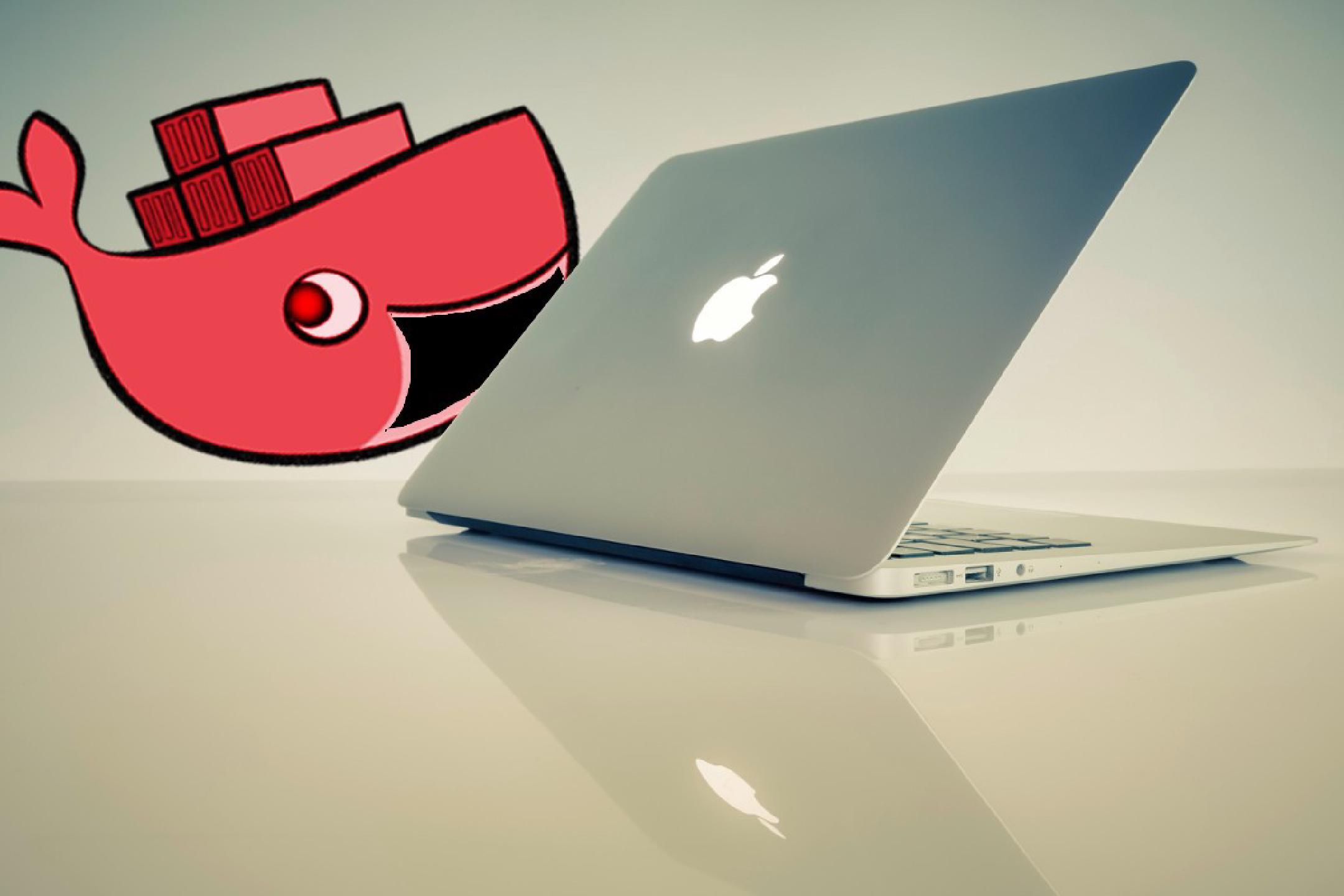 a semi-open MacBook Pro sitting inconspicously on a table with a cartoon drawing of a whale threatening to swallow it in the background